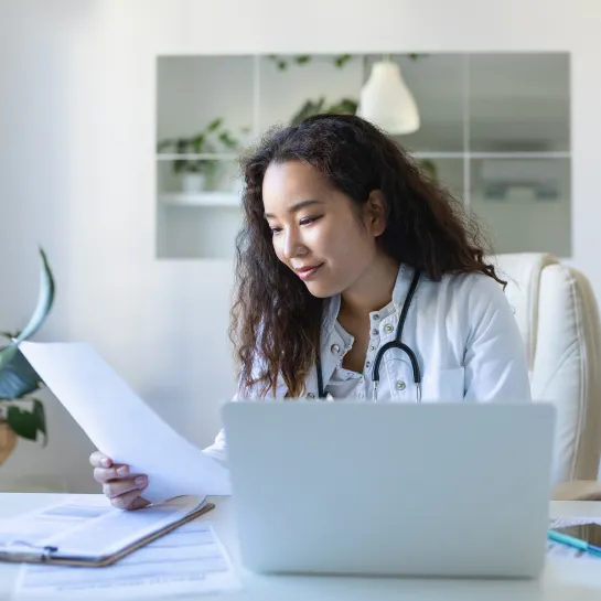 Doctor looking at a patient’s record