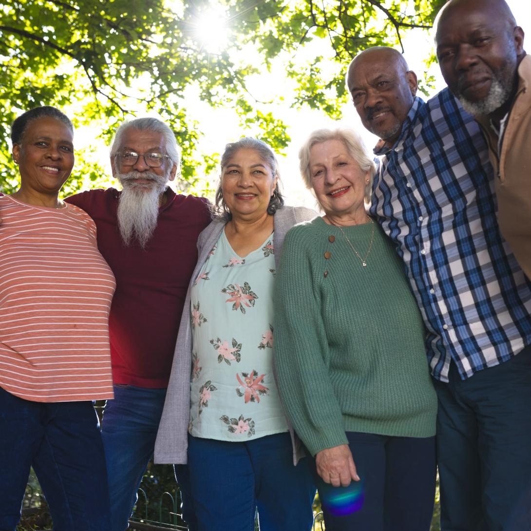 Smiling group of seniors outside