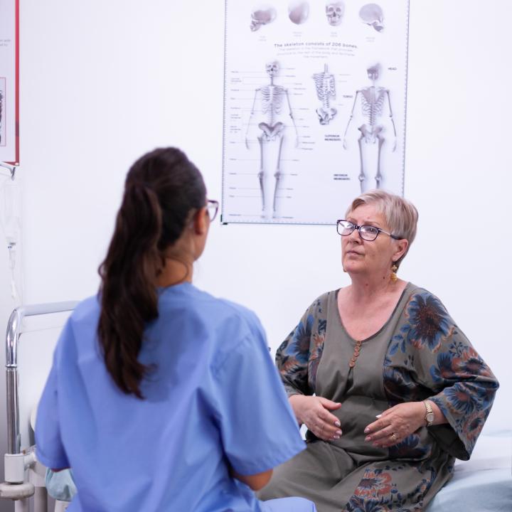 Senior woman talking to physician