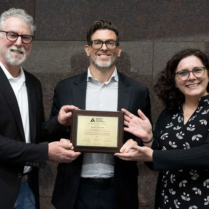 Kory K. Hood, PhD, being presented with the ADA Richard R. Rubin award