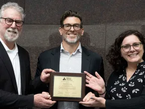 Kory K. Hood, PhD, being presented with the ADA Richard R. Rubin award