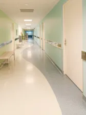 Long empty hospital hallway