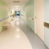 Long empty hospital hallway