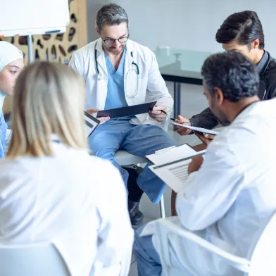 Diverse medical team discussing procedures