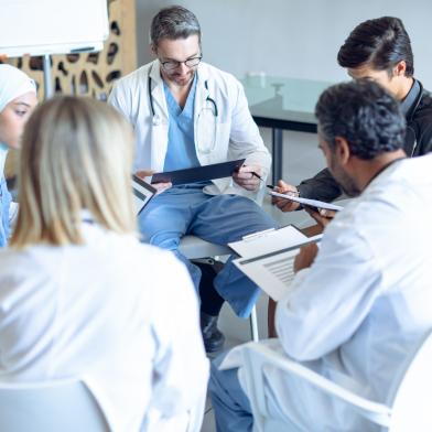 Diverse medical team discussing procedures