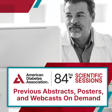 Research at computer behind banner with previous abstracts, posters, and webcasts on deman