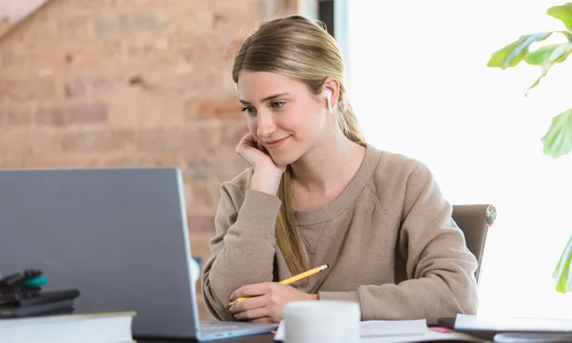 Woman studying on a laptop
