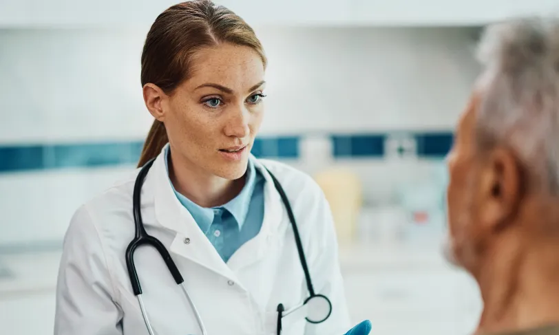 Female physician talking to patient