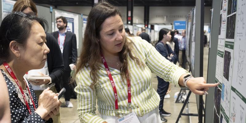Researchers discussing diabetes abstract at annual meeting