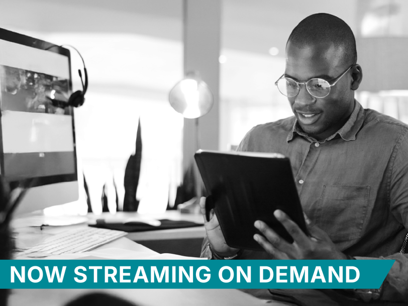 Man looking at tablet computer Now Streaming On Demand