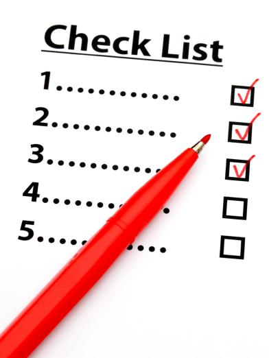 Checklist with red pen