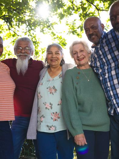 Smiling group of seniors outside