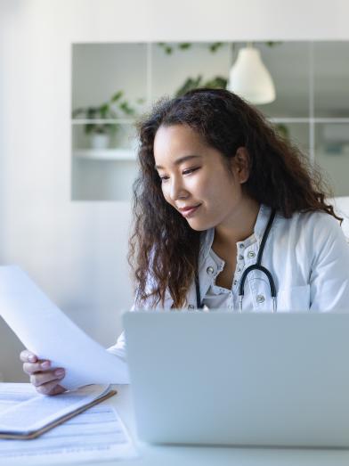 Doctor looking at a patient’s record